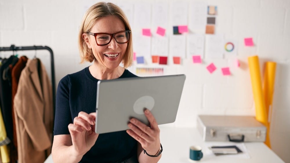 Woman with tablet. Start your own business.